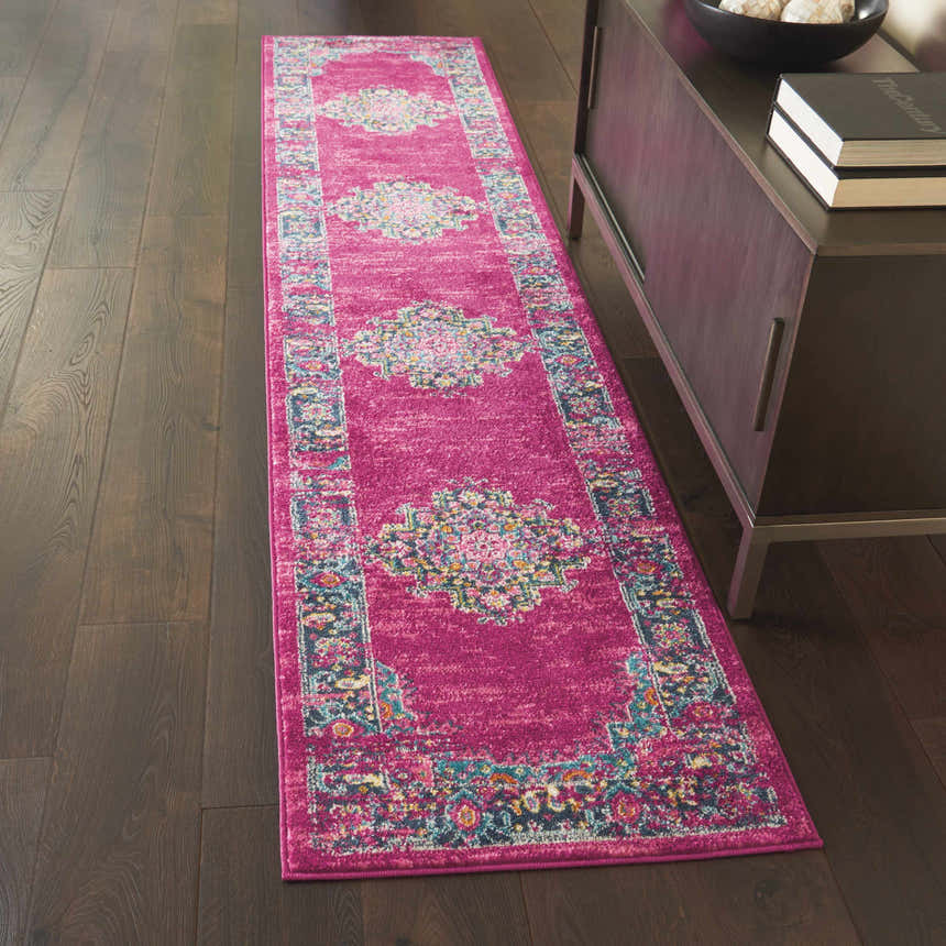 Hallway scene with a Nourison Passion Fuchsia rug runner on dark wood floors, next to a console table.