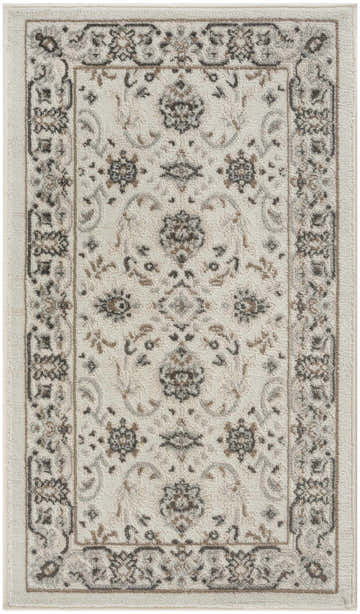 Close-up of the Nourison Serenity Home Ivory Mocha Vintage Area Rug. High pile rug with chestnut, floral, vintage design.