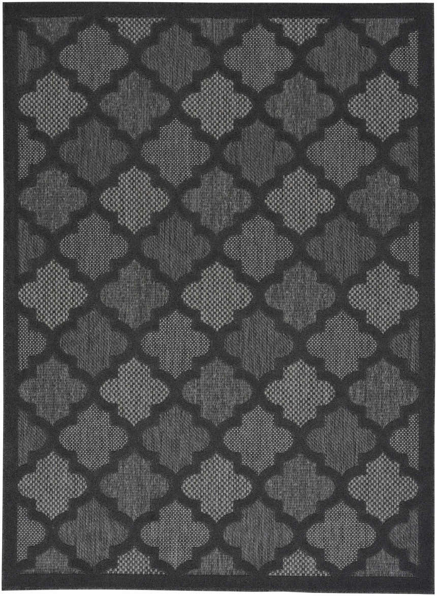 Close-up of the Nourison Easy Care Charcoal Black Modern Area Rug with a taupe quatrefoil pattern.