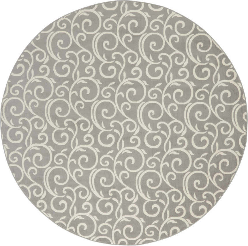 Close-up of a round Nourison Grafix Grey rug. Features a swirling, contemporary white pattern on a gray background.