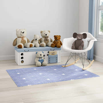 Kids room scene with a light blue Nourison Imagination washable area rug, toy chest, teddy bears, and rocking chair.