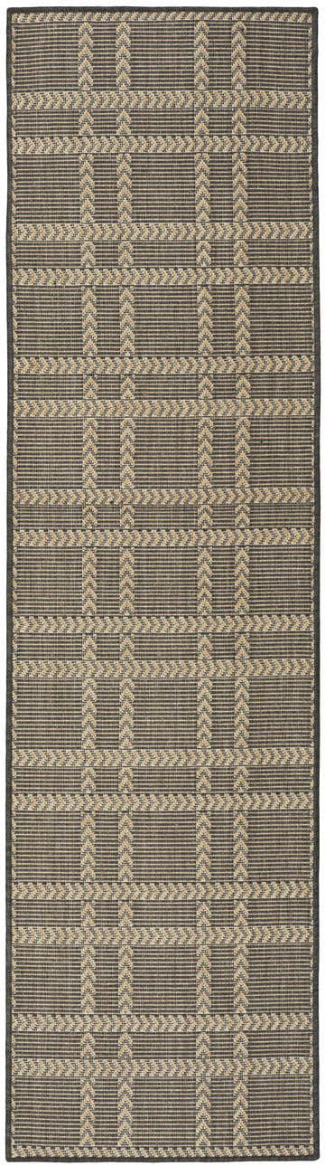 Close-up of Nourison Horizon Charcoal rug showing taupe geometric plaid pattern and texture. Modern indoor/outdoor rug.