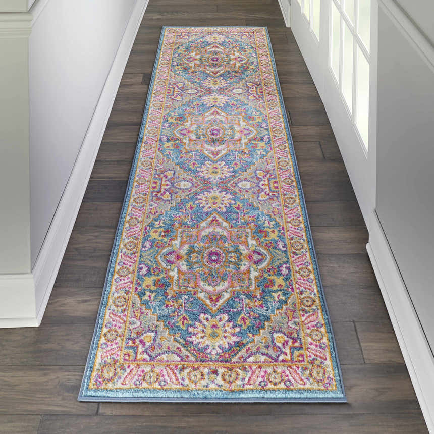 Hallway with Nourison Passion Teal Multicolor Bohemian Indoor Area Rug runner on dark wood floor.