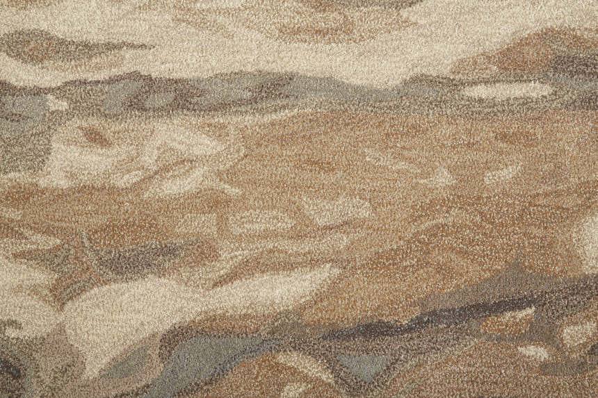 Close-up of the Feizy Amira rug showing its abstract brown, gray, and tan pattern and hand-tufted wool texture. Texture