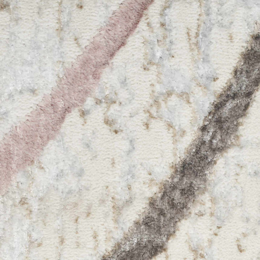 Close-up of the Nourison Glitz Ivory Multicolor rug showing the texture and chestnut, pink, and gray diagonal stripes.