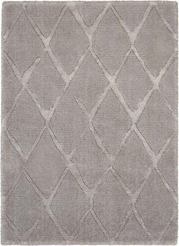 Close-up of the grey Nourison Twilight rug featuring a diamond lattice pattern and soft, textured wool and luxcelle fibers.