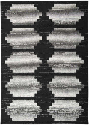 Close-up of the Nourison Modern Passion Black Grey rug, featuring a geometric, mid-century modern pattern.