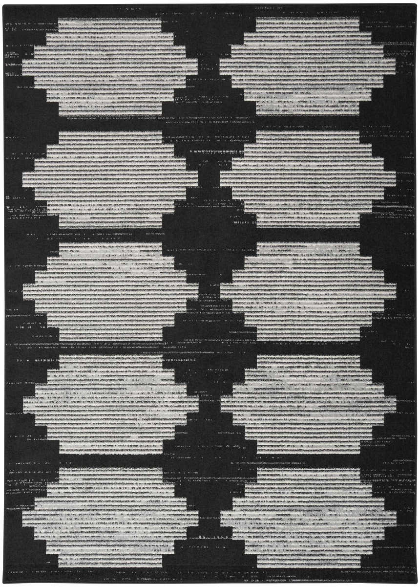 Close-up of the Nourison Modern Passion Black Grey rug, featuring a geometric, mid-century modern pattern.
