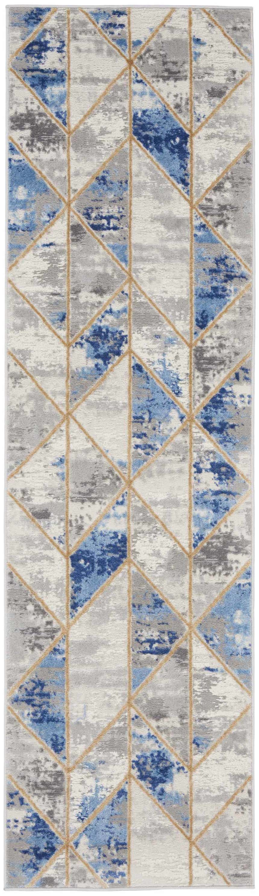 Close-up of Nourison Elation Grey Multicolor rug. Modern geometric design with blue, gray, and tan hues. High pile texture.