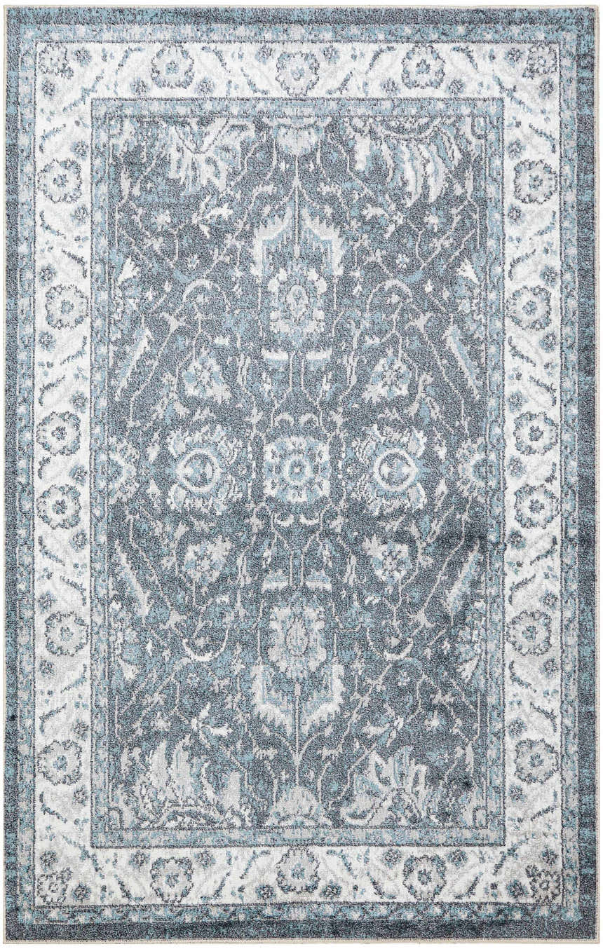 Close-up of the Nourison Astra Slate Vintage Rug with taupe, gray, and light blue floral pattern.