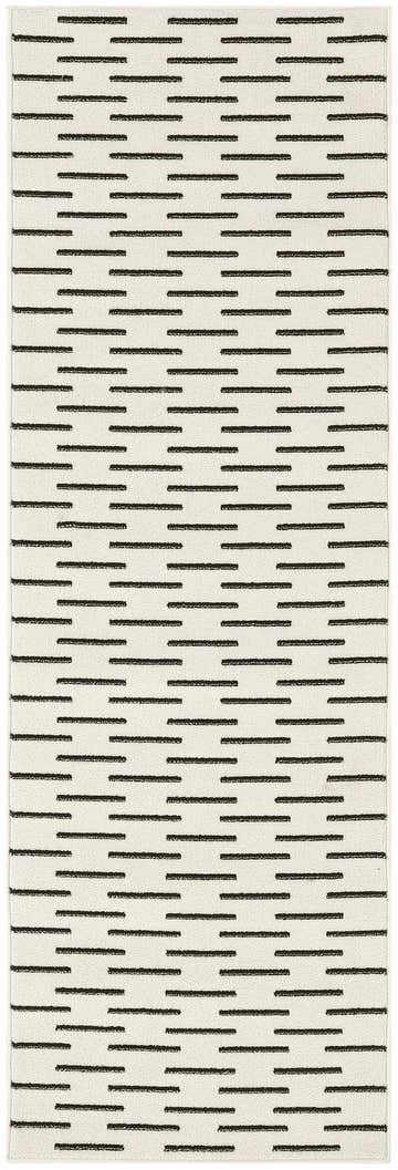 Close-up of the Nourison Nordic Ivory Black rug, showcasing its Scandinavian design with a pattern of horizontal black dashes.