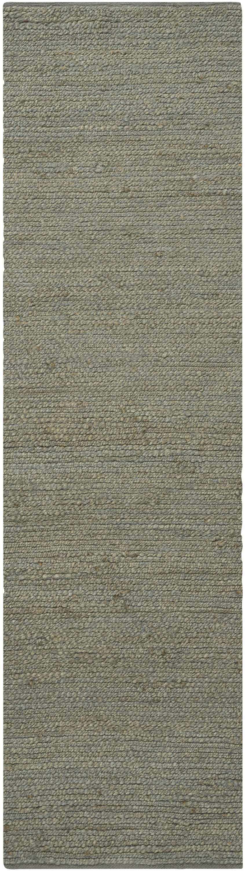 Close-up of the Nourison Natural Jute Sage Farmhouse Area Rug. Handmade rug texture in muted sage and charcoal tones.