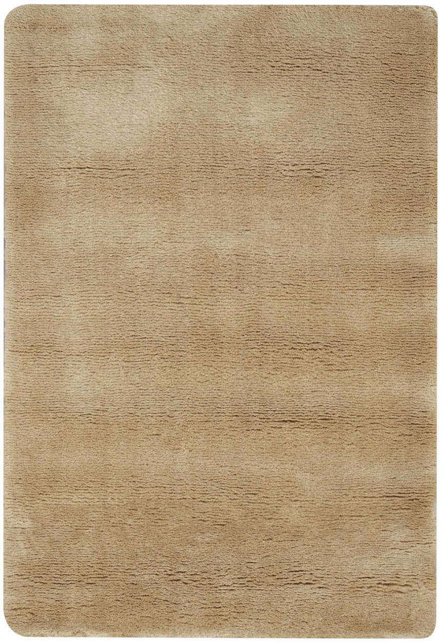 Close-up of the plush Nourison Plush Cloud Camel rug. Handmade, soft cashmere and wool blend texture.