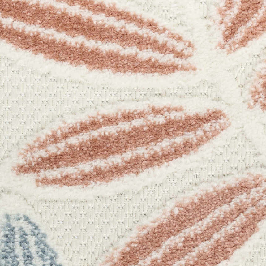 Close-up of Nourison Aloha Ivory Blue rug showing chestnut, ivory, and blue colors and textured pile.