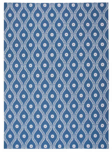 Close-up of Nourison Home & Garden Navy Coastal Area Rug. Features a white floral and leaf pattern on a blue background.