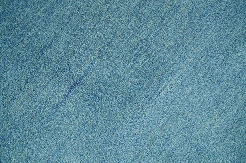Custom Made Hand Tufted Solid Plane Light Blue Woolen wool Area Rug
