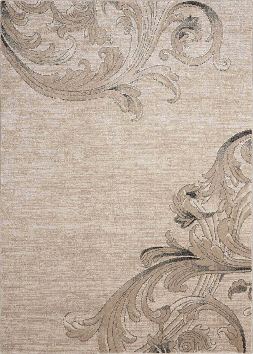 Close-up of the Nourison Maxell Mocha rug. Light brown farmhouse rug with a subtle floral scroll pattern.