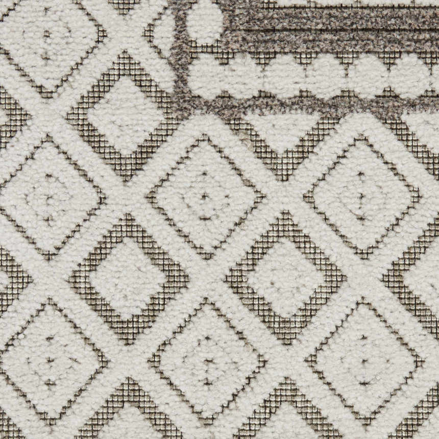 Close-up of the Nourison Key Largo Light Grey rug, featuring a diamond pattern with textured gray accents.