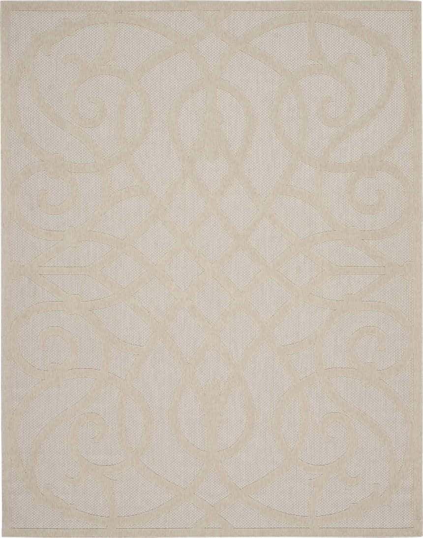 Close-up of the cream Nourison Cozumel rug, featuring a subtle farmhouse pattern and textured weave.