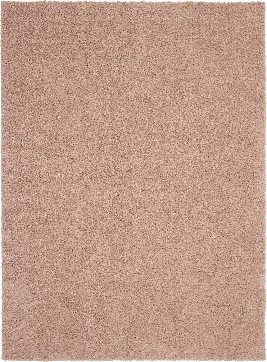 Close-up of the plush texture of the Nourison Malibu Shag Blush rug. Soft blush pink shag rug.