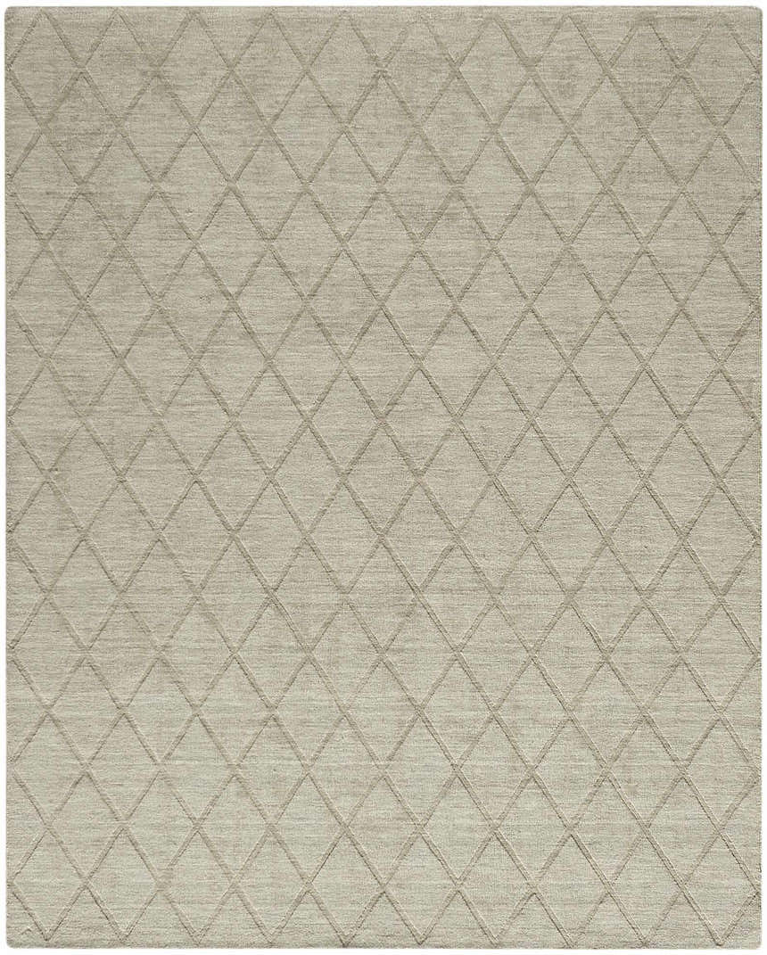 Close-up of Nourison Wool Haven Sage rug. Muted sage wool rug with a subtle diamond pattern. Handmade, mid-century modern style.