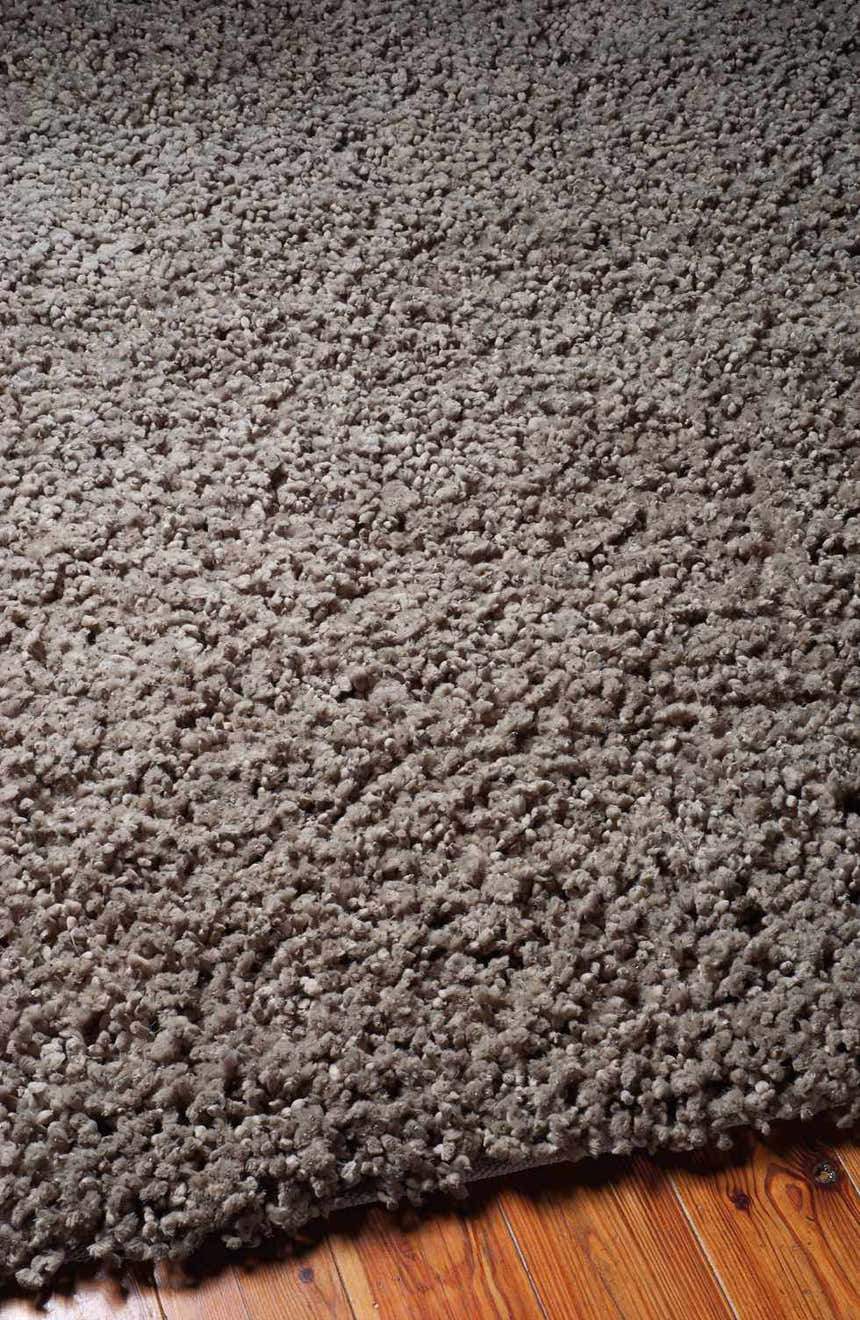 Close-up of the plush texture and gray color of the Nourison Zen Shag Area Rug.