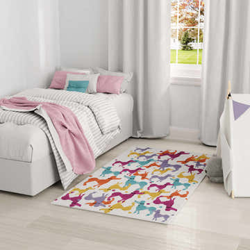 Kids bedroom with Nourison Imagination Ivory Multicolor rug, bed, teepee, and bright natural light.