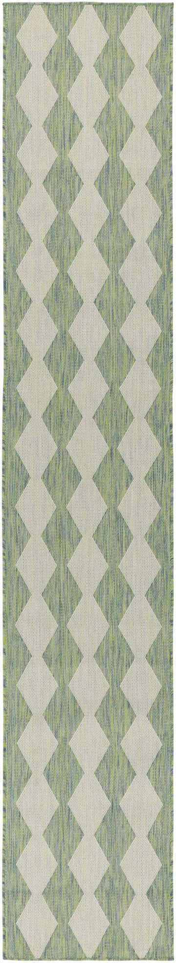 Close-up of the Nourison Positano Blue Green rug featuring a diamond pattern and textured weave.