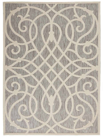 Close-up of the Nourison Cozumel Grey Farmhouse Area Rug, featuring a geometric lattice and scroll pattern in light beige and gray.