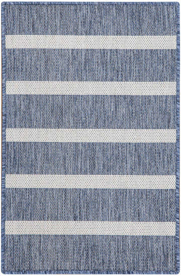 Close-up of the Nourison Positano Navy Ivory Area Rug featuring a striped pattern and textured weave.