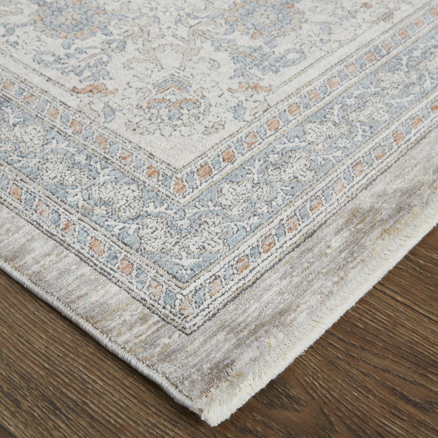Close up of Feizy Marquette rug. Taupe, silver, and blue oriental pattern and texture. Corner
