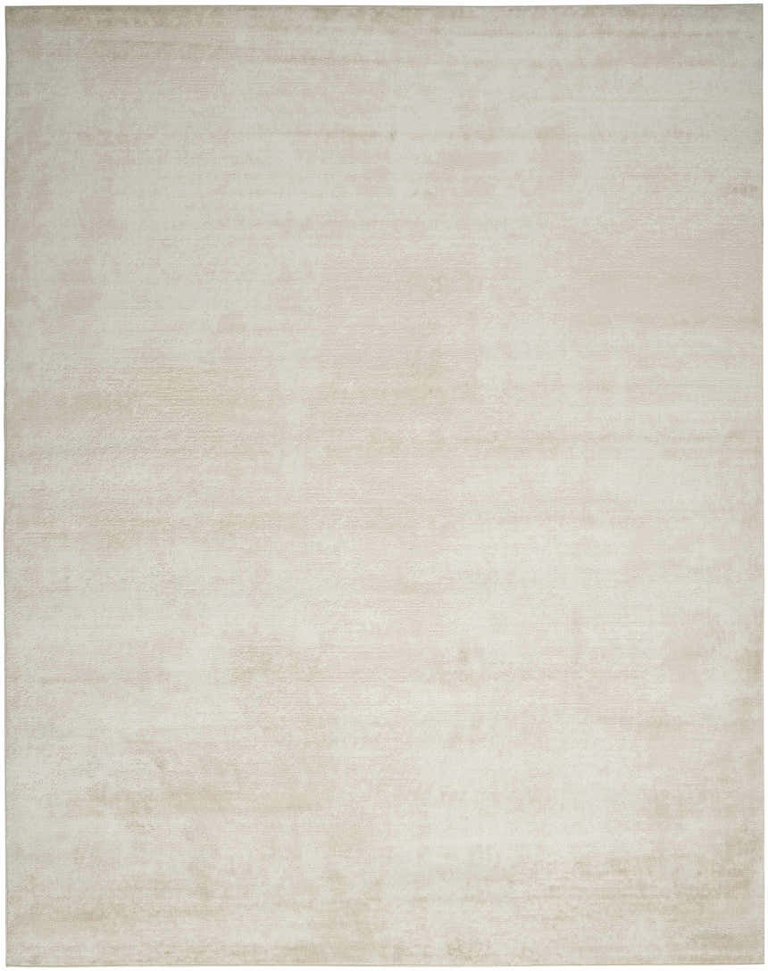 Close-up of the ivory Nourison Serenity Home rug. High pile texture with subtle, modern design. Chestnut color variations.