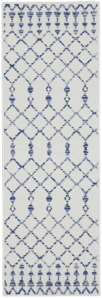 Close-up of Nourison Whimsicle Ivory Bohemian Indoor Area Rug featuring a blue diamond and geometric pattern.