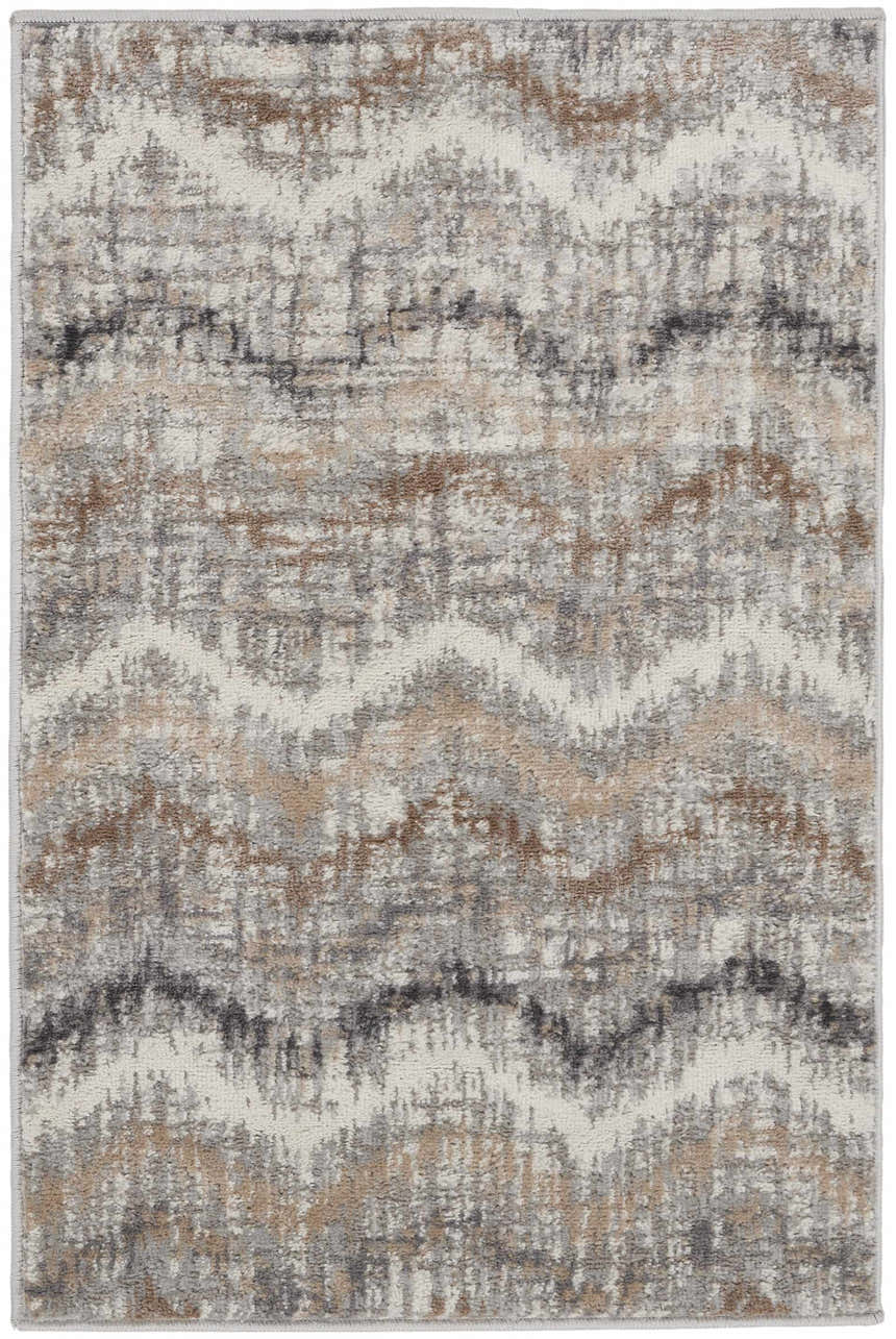 Close-up of the Nourison Elation Grey Ivory rug. High pile rug with mid-century modern design in chestnut, grey, and ivory.