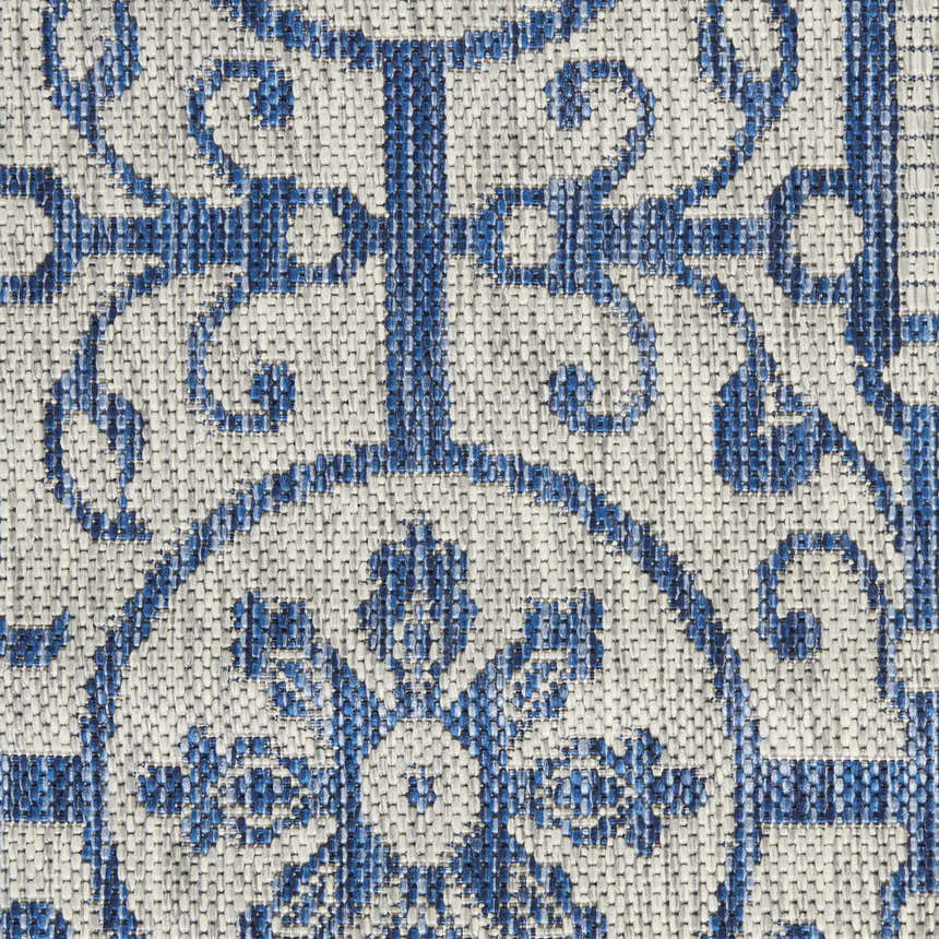Close-up of the Nourison Country Side Ivory Blue Transitional Area Rug showing the farmhouse floral pattern and texture.