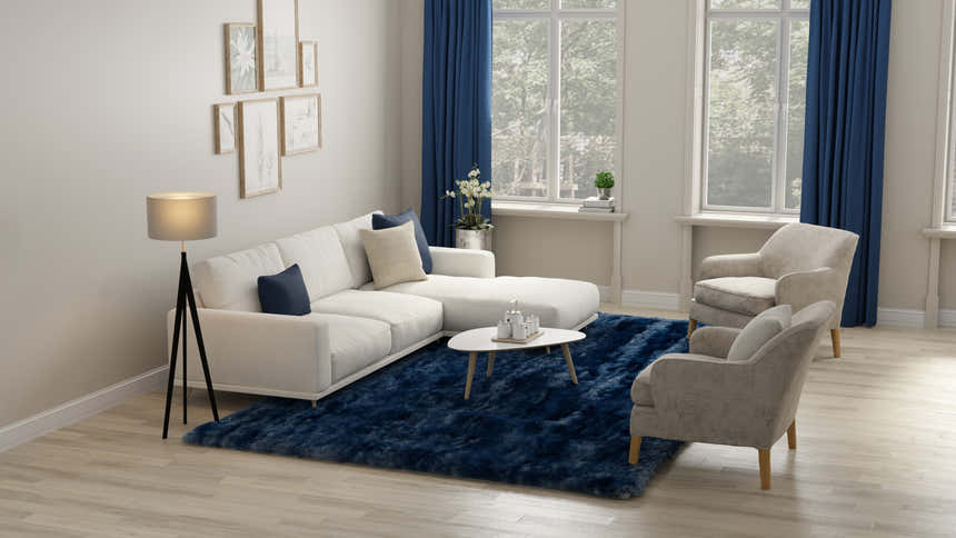 Living room with white sofa and Feizy Indochine indigo rug, for a contemporary and luxurious look. Roomscene-Rectangle