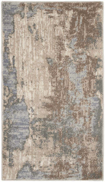 Close-up of Nourison Moroccan Celebration Grey Beige Rug, showing abstract pattern and soft texture.