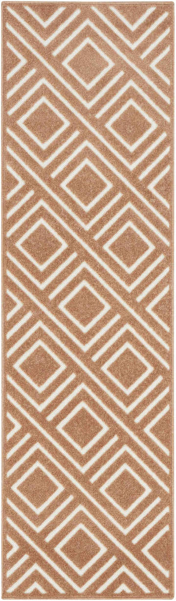 Close-up of Nourison Care Free Copper rug. Caramel color with geometric diamond pattern. Mid-century modern style.
