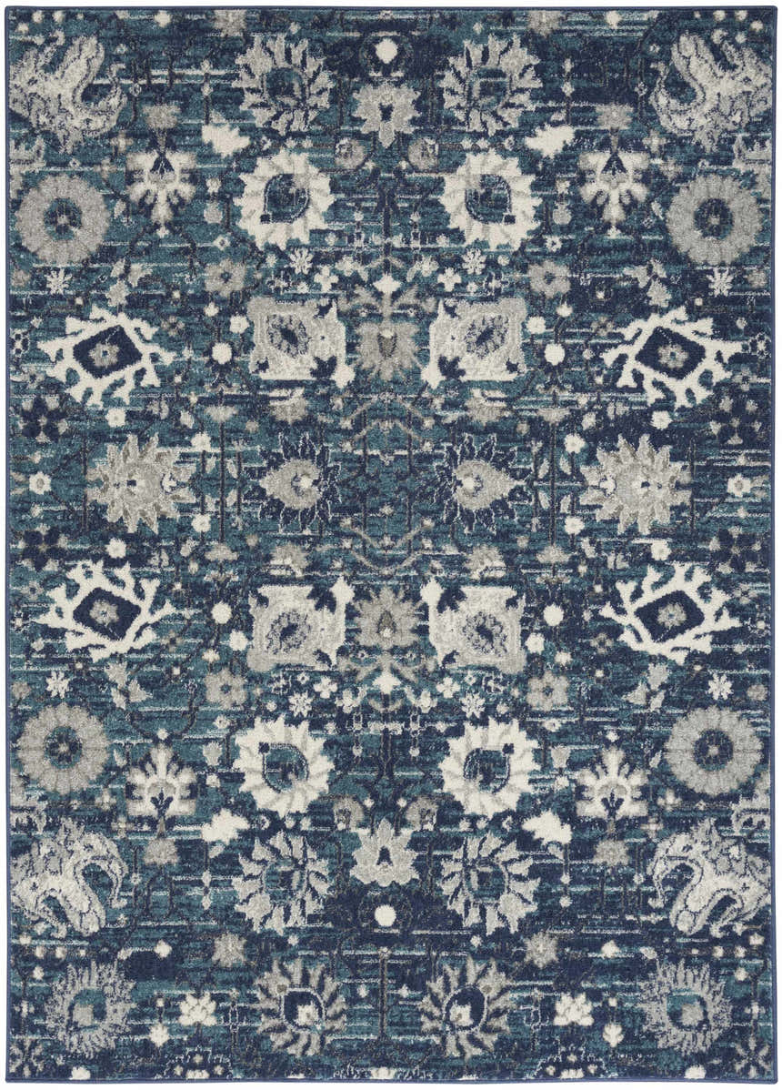 Close-up of the Nourison Passion Surf Bohemian Area Rug. Surf blue, gray, and white floral medallion pattern.