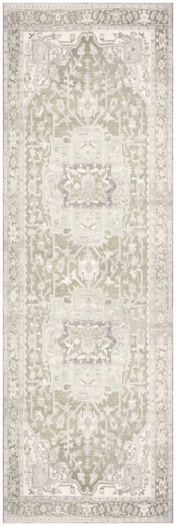 Close-up of Nourison Vintage s Green Vintage Indoor Washable Area Rug. Features a traditional floral pattern and soft green hues.