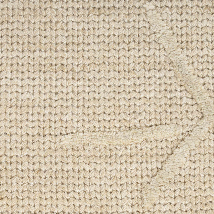 Close-up of the natural, textured weave of the Calvin Klein CK044 Wander rug. Wool and rayon blend.