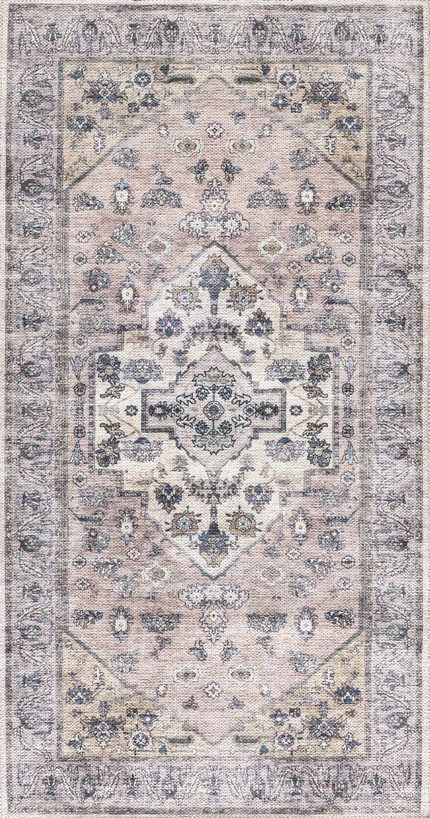 Close-up of the Nourison Grand s Blush Vintage Indoor Washable Area Rug, featuring a faded floral pattern and ornate border.