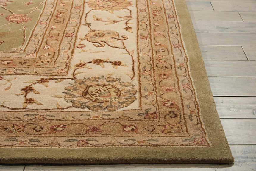 Close-up of the Nourison 3000 Light Green Persian rug, showcasing floral patterns and wool-silk texture.