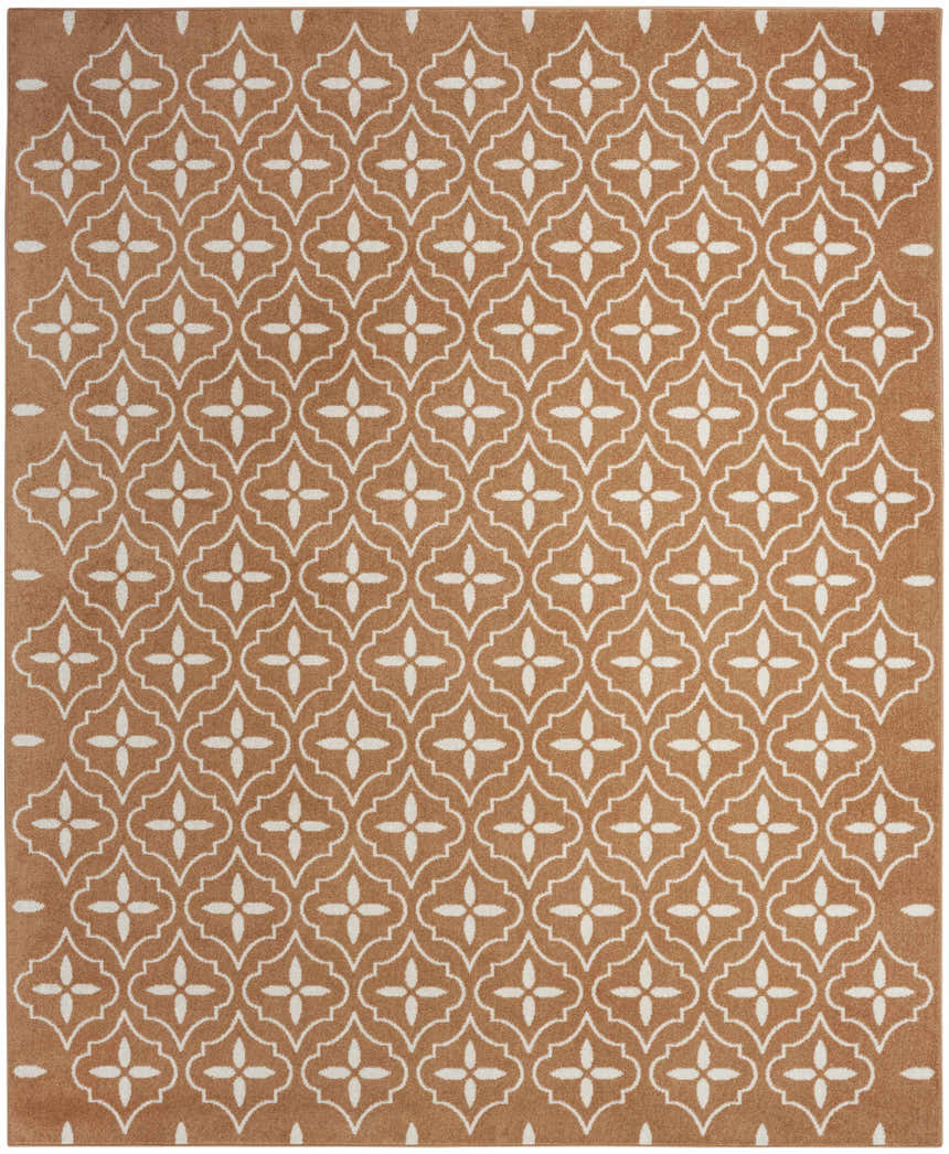 Close-up of the Nourison Essentials Copper Modern Area Rug featuring a caramel backdrop and a white quatrefoil pattern.