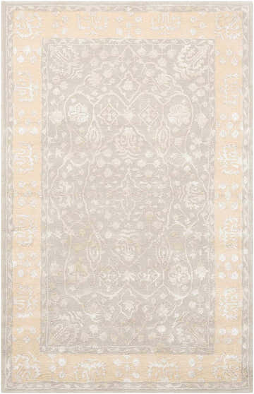 Close-up of Nourison Symphony Blue Mist rug. Rectangle shape, handmade wool blend, floral pattern in blue, beige, and ivory.