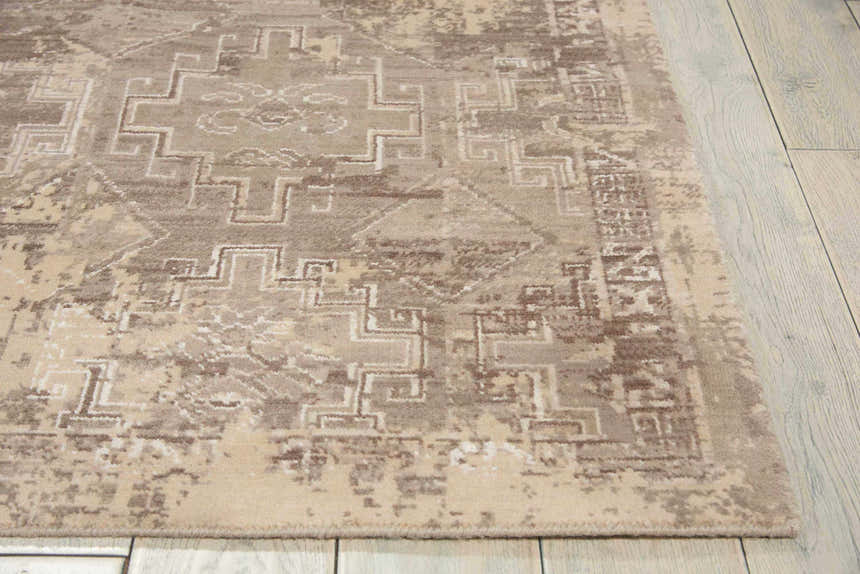 Close up of Nourison Silk Elements Mushroom Persian rug showing wool texture and geometric pattern.