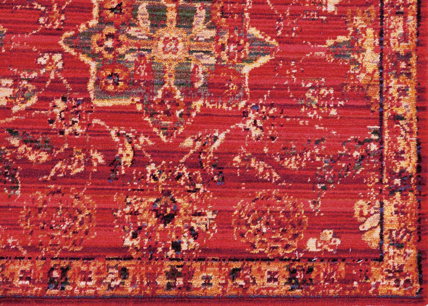 Close-up of the Nourison Timeless Red Persian Rug, showcasing its traditional floral pattern and rich red hues.