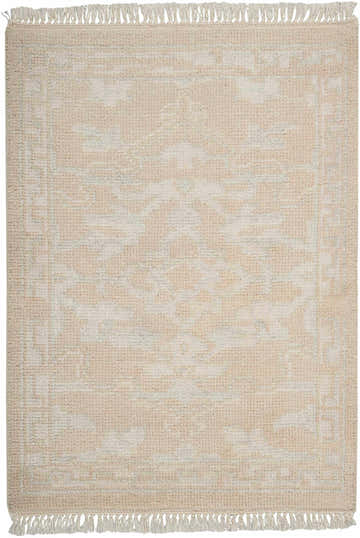 Close-up of the Nourison Elan Ivory Vintage Indoor Area Rug, showcasing its wool texture, fringe, and subtle chestnut pattern.