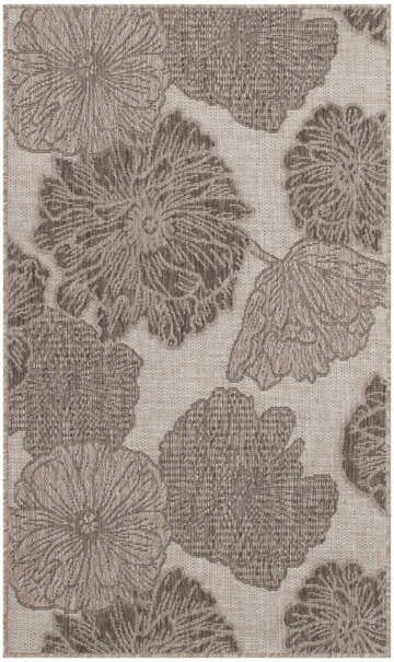 Close-up of the Nourison Garden Oasis Natural Tropical Area Rug. Beige background with brick red floral pattern and woven texture.