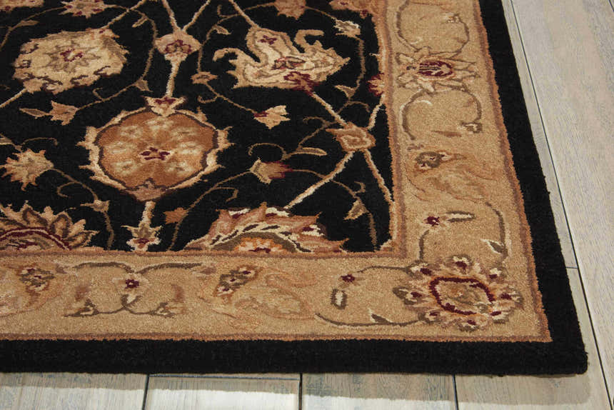 Close-up of the handmade Nourison 3000 Black Persian rug showing floral pattern and wool and silk texture.